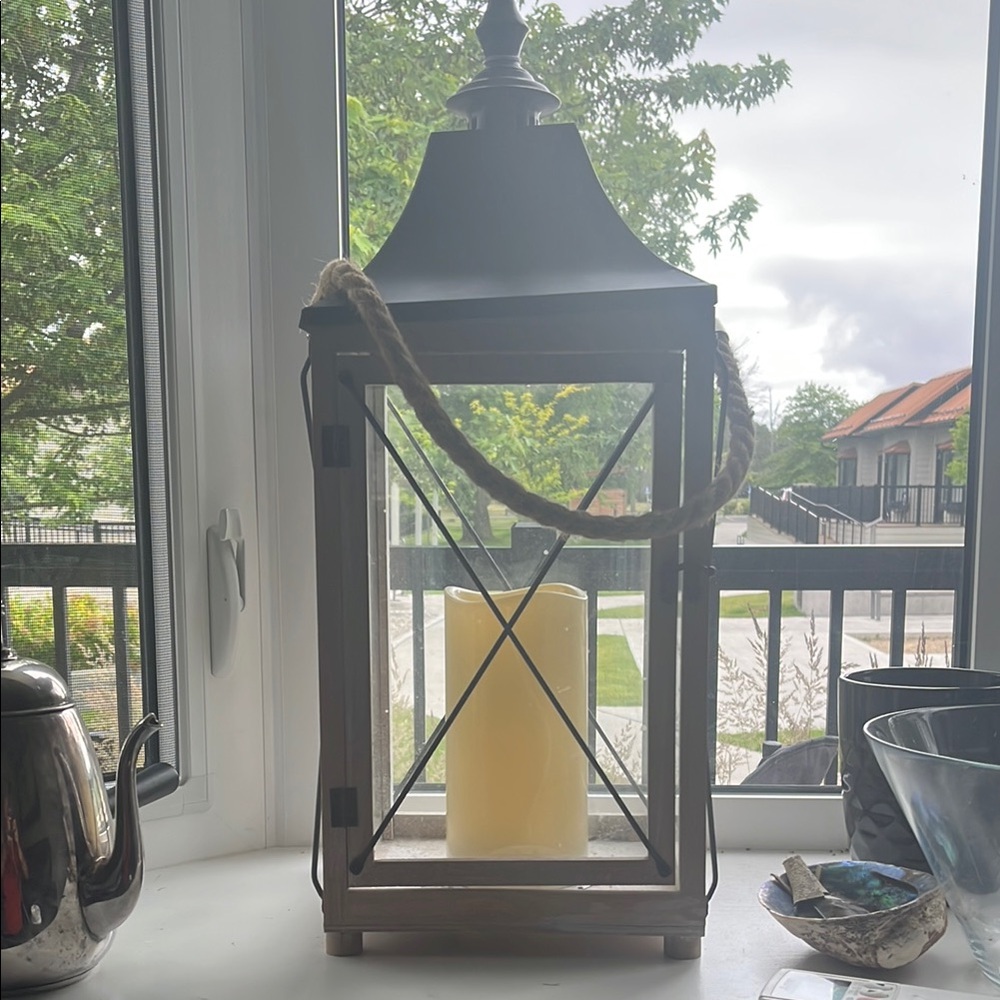 Tan Geometric Lantern with luminous candle